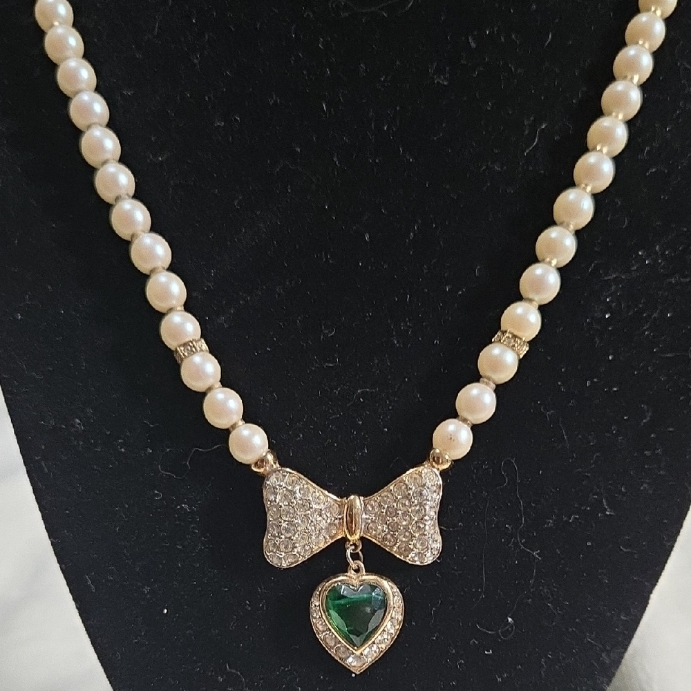Elegant Pearl Necklace with Green Heart Pendant